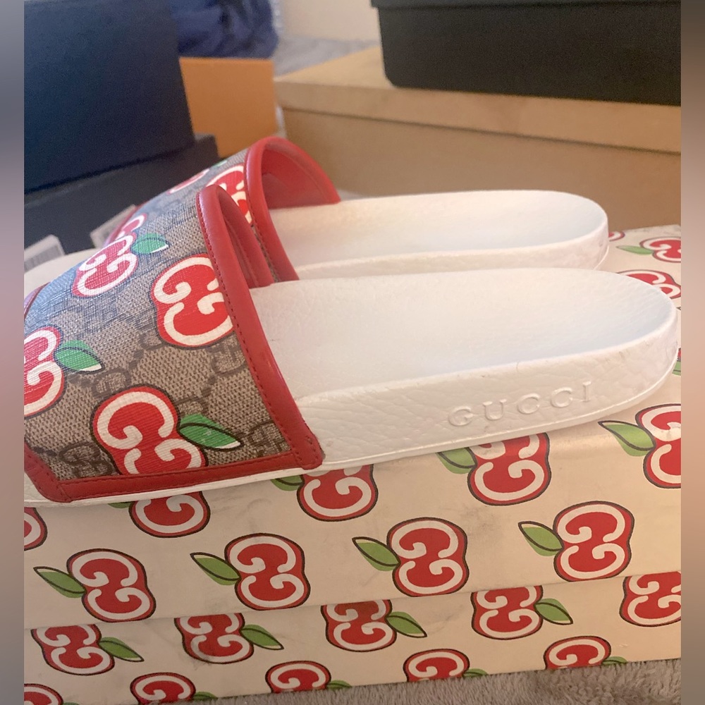 White and red Gucci slides